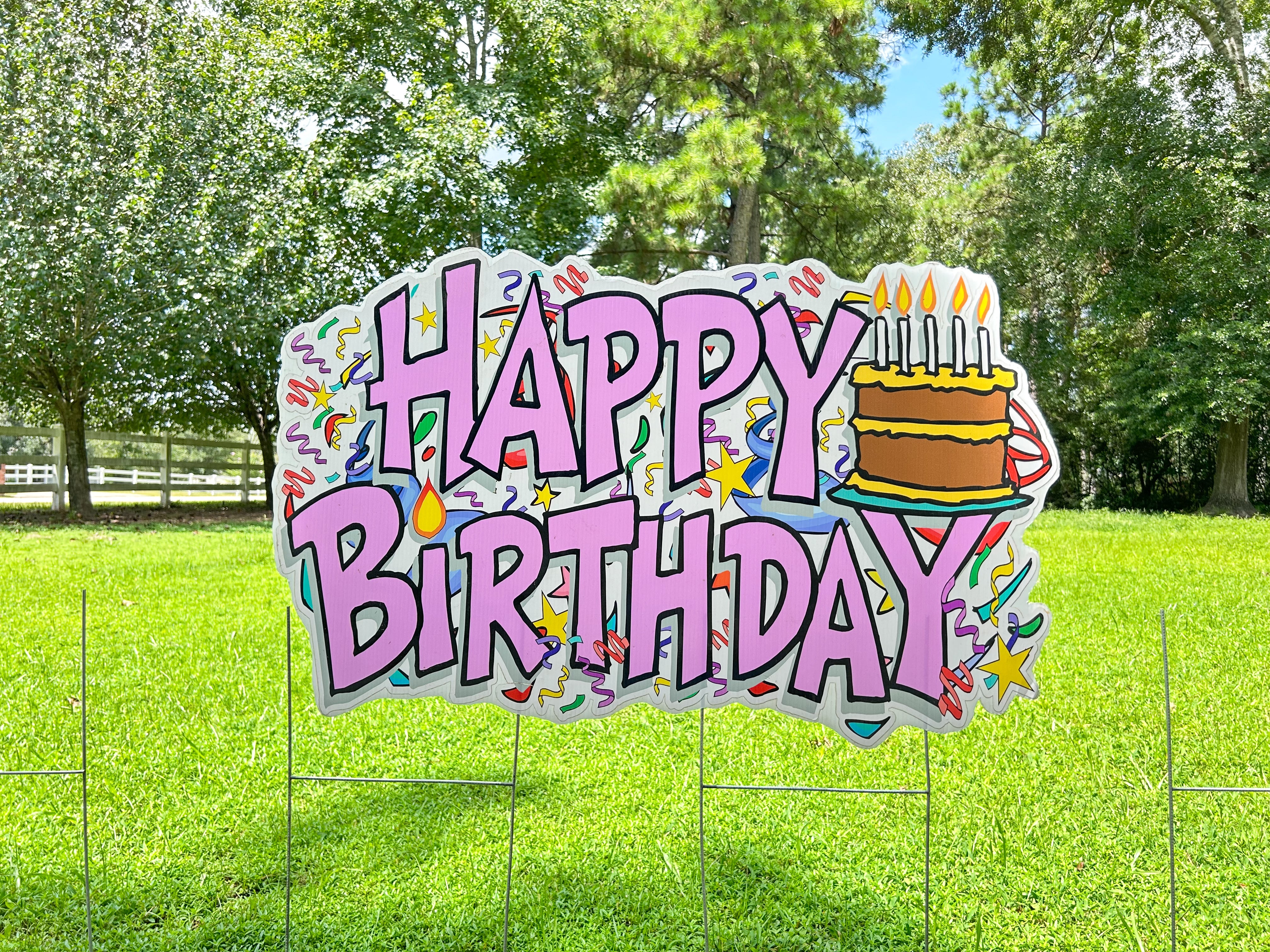 A festive display of Texas Party in the Yard's birthday flash signs, featuring vibrant 