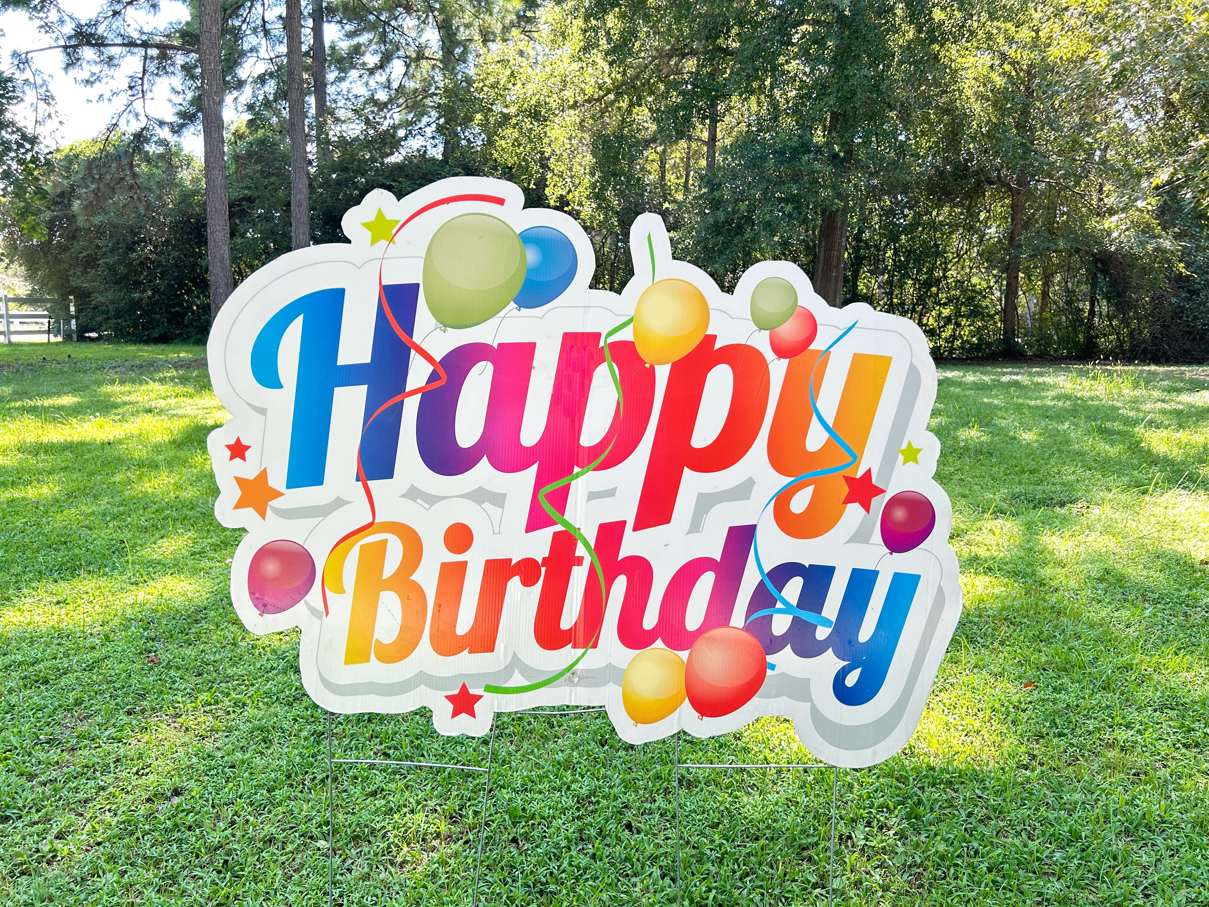 A festive display of Texas Party in the Yard's birthday flash signs, featuring vibrant 