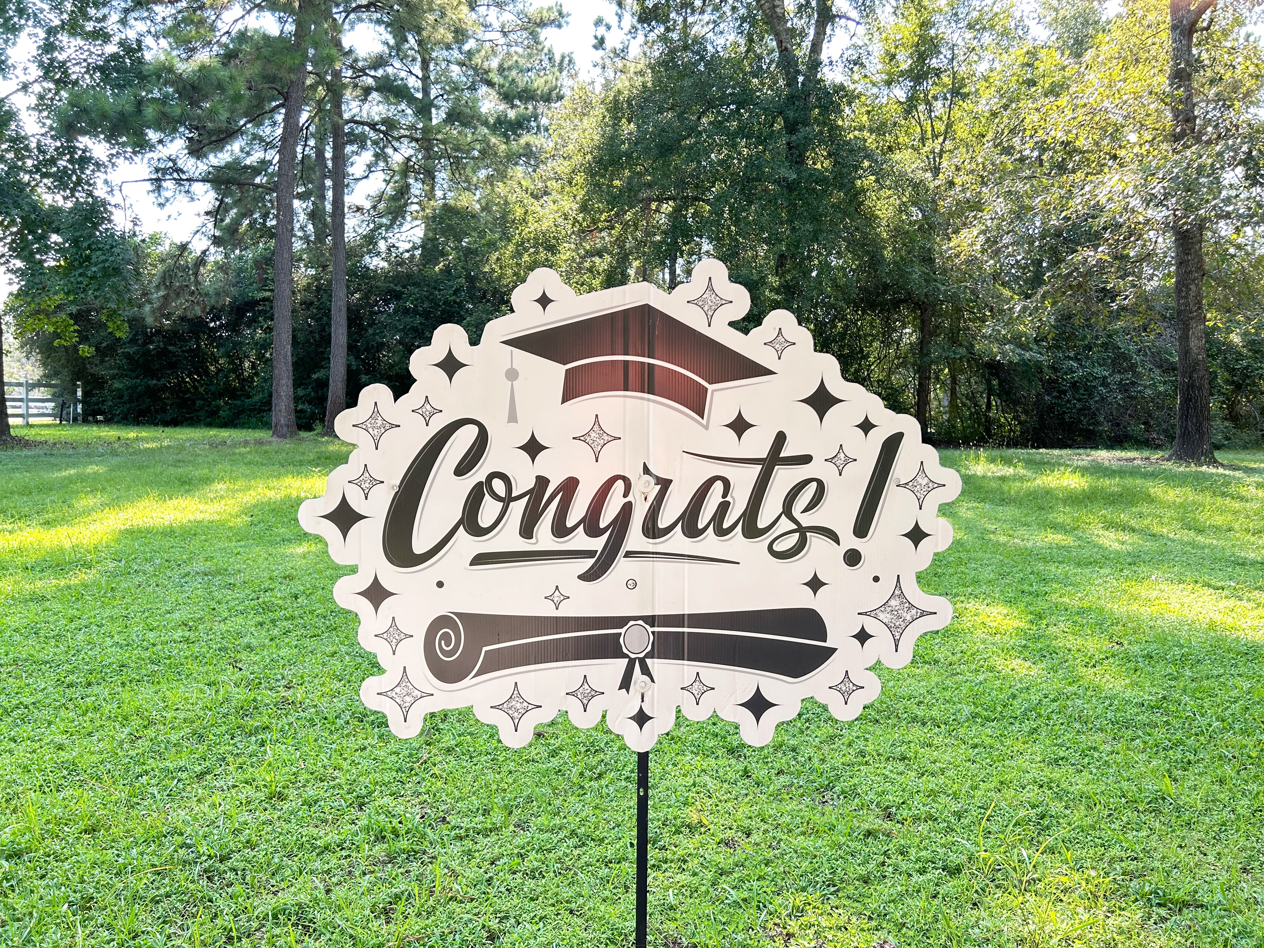 A dynamic display of Texas Party in the Yard's graduation flash signs, featuring bold 